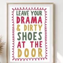 Typographic print reading Leave your drama and dirty shoes at the door in red, green and gold
